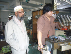 Saifuddin is with Technician Jin.jpg