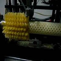 making roller brush with tampico filaments